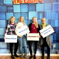 Karin with her sister, mom, and Aunt after solving an escape room in Durham