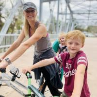 Karin and her children out for a bike ride on the Greenville Greenway