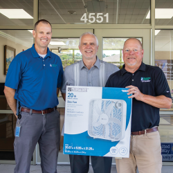 Jonathan Sergeant (Energy Services), Council on Aging Executive Director Rich Zeck, and Scott Mullis (Customer Relations)