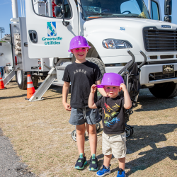 Two kids at the Pigskin Touch Arrggh Truck