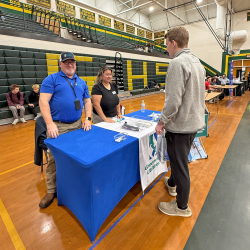 Eban Kea (IT) and Aracely Smith (HR) at the Ayden Grifton High School Career & College Fair
