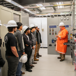 Nick Peaden gives PCC students a tour of the 230 West Electric Substation