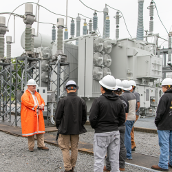 Nick Peaden gives PCC students a tour of the 230 West Electric Substation