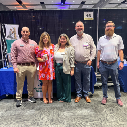 Dillon Wade (Gas), Jessica Hardy (Finance), Aracely Smith (HR), Nick Klapp, and Aaron Johnson (IT) at the ECU Job and Internship Fair.