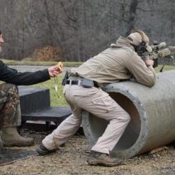 Vincent participating in a gun competition.