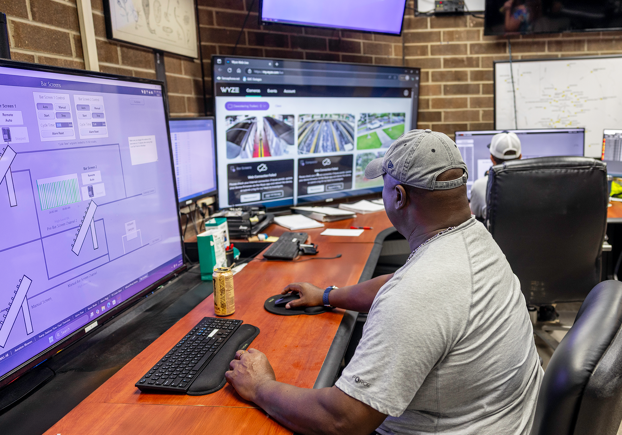 WWTP Operator III Julius Phillips monitors the influent bar screens on SCADA in the WWTP control room.