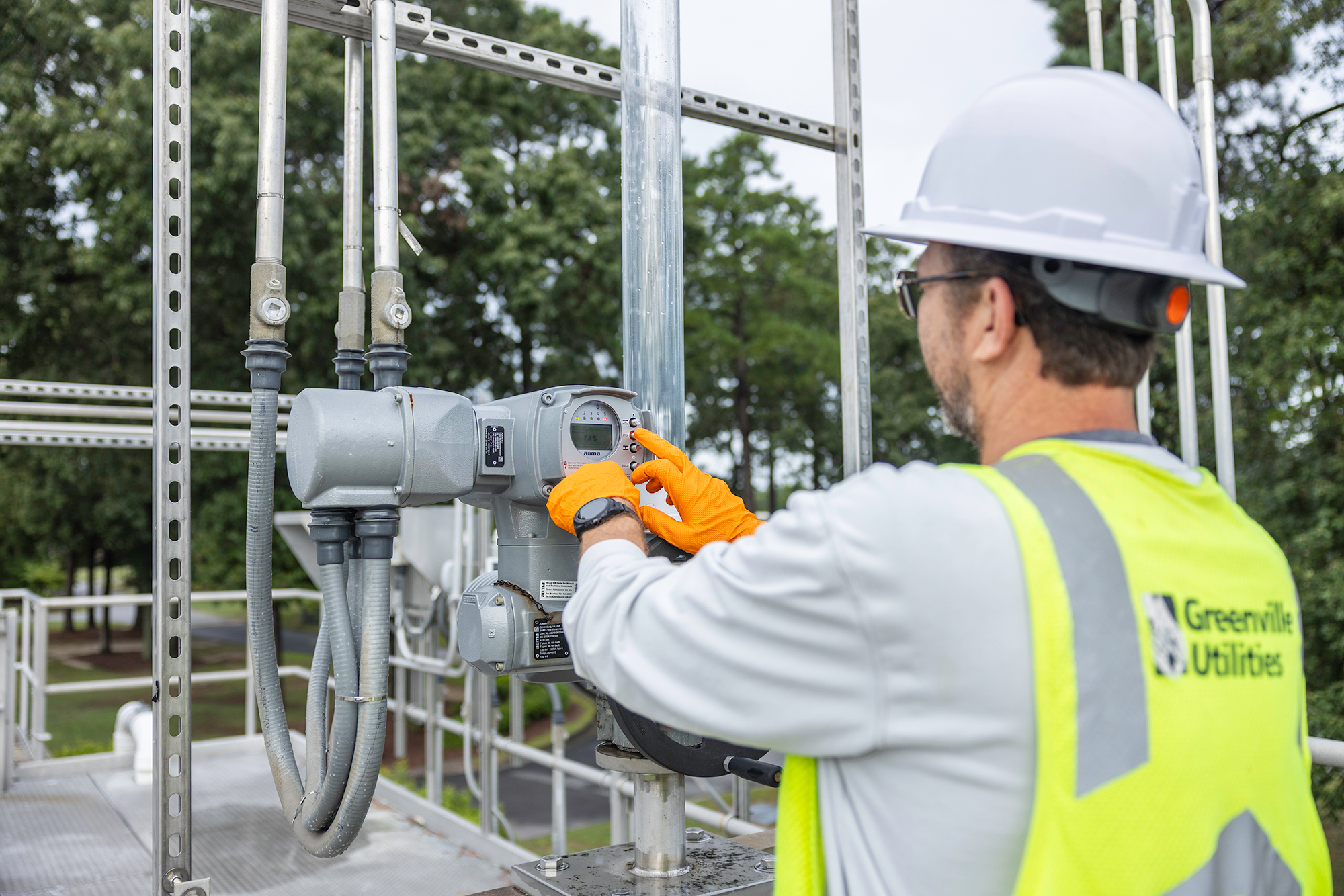 WWTP Operator II Jason Harmon adjusts a flow control valve at our influent structure.
