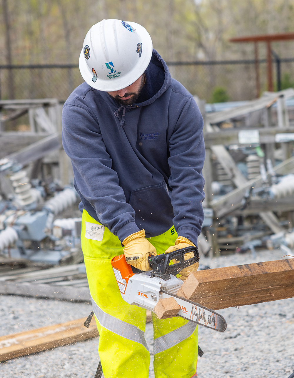 Matt McLawhorn learns how to operate a chainsaw.