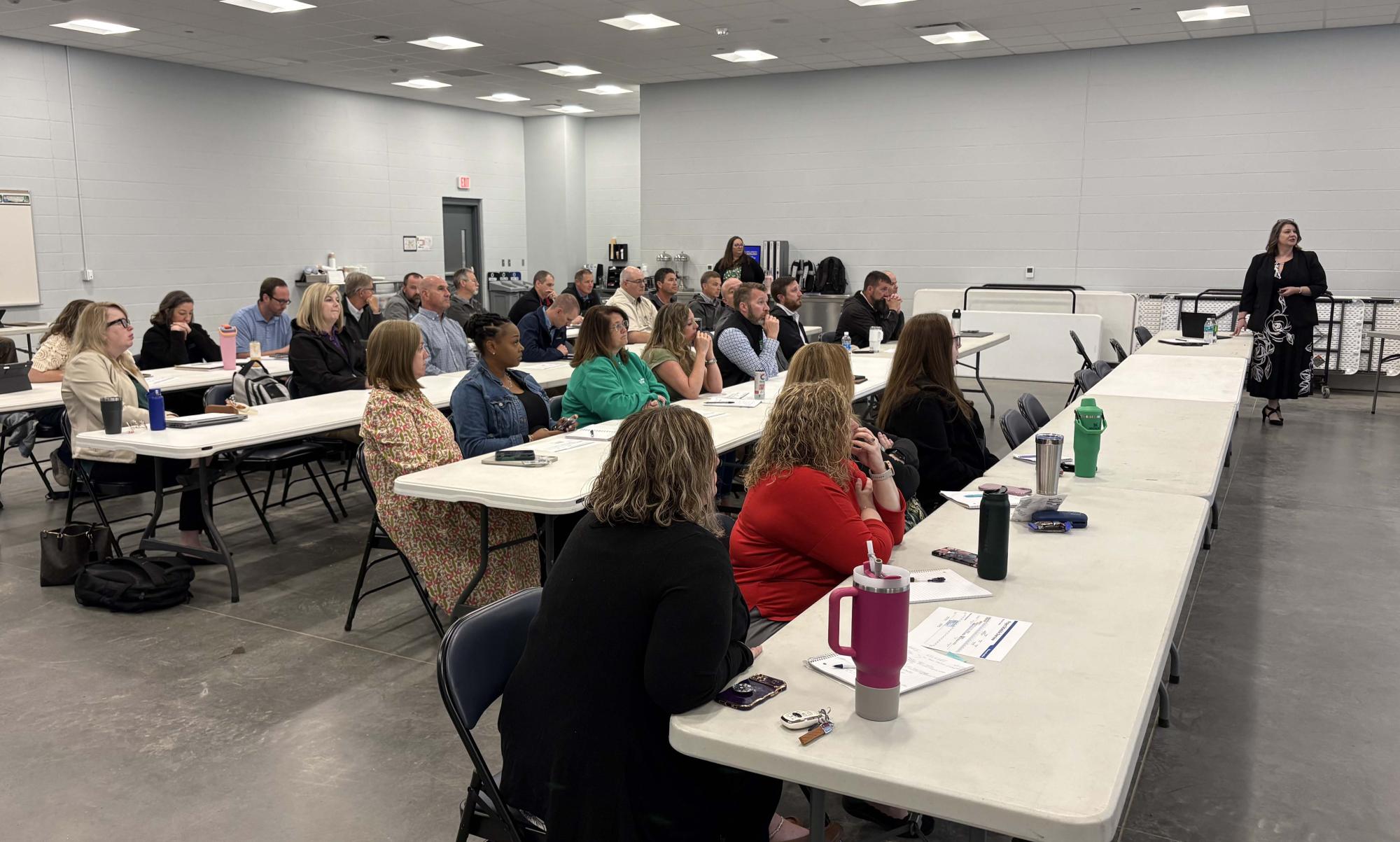 group sits in introduction session