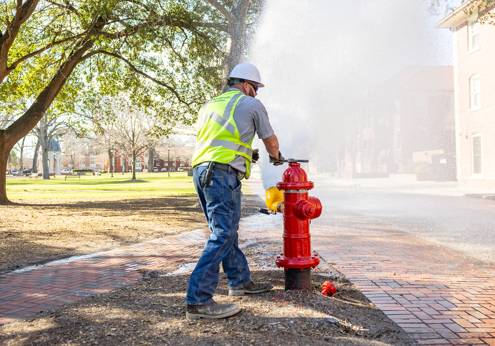 Man flushing a fire hydrant